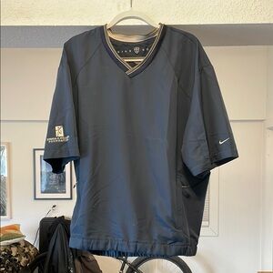 Vintage Nike Golf Men'sBlue V-Neck Pullover Shirt